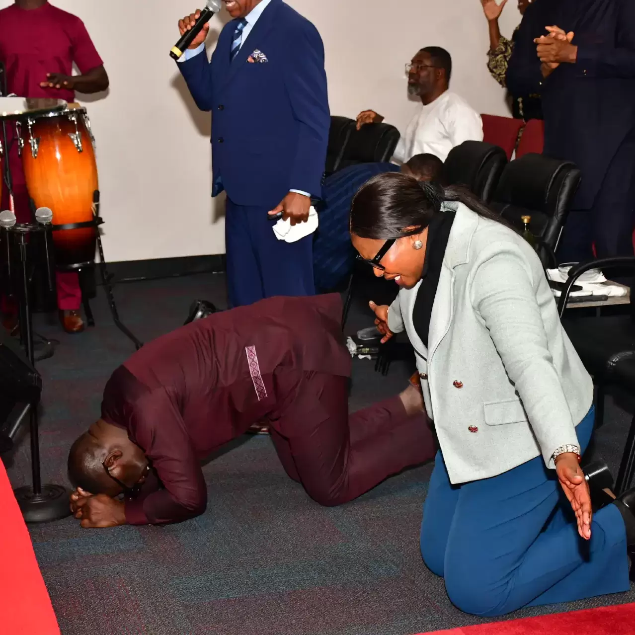 Pastors and ministers praying during intercessory prayer at RCCG City on a Hill, Lawrenceville, Georgia