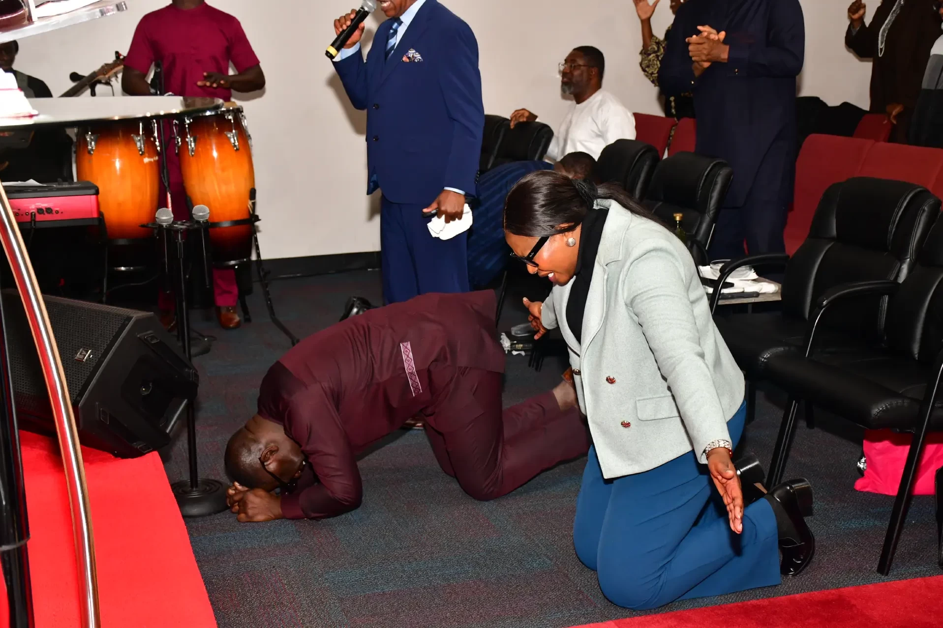 Pastors and ministers praying during intercessory prayer at RCCG City on a Hill, Lawrenceville, Georgia