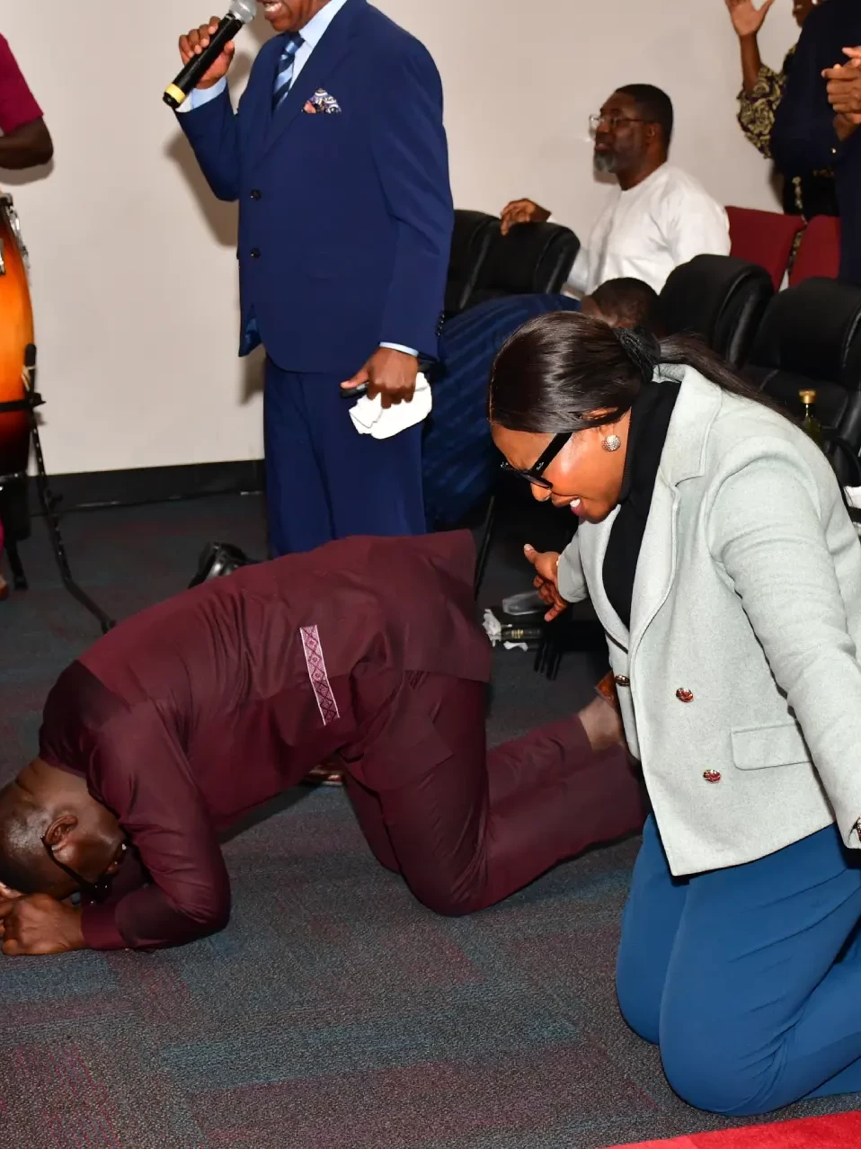 Pastors and ministers praying during intercessory prayer at RCCG City on a Hill, Lawrenceville, Georgia