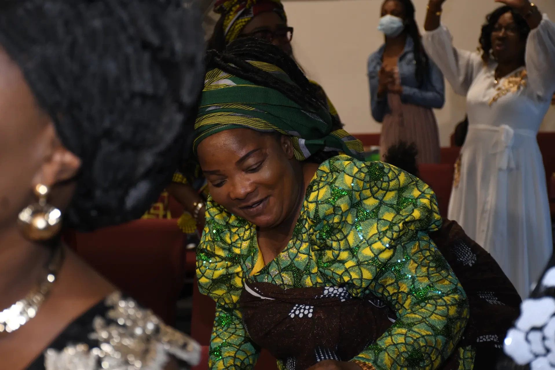 Woman worshipping during Women’s Fellowship service at RCCG City on a Hill, Lawrenceville, Georgia