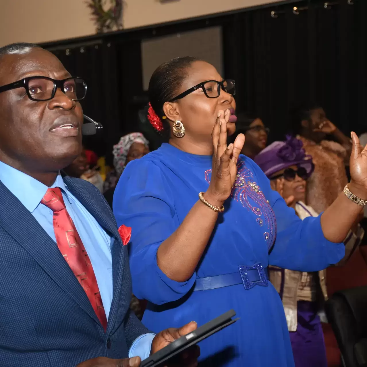Church leaders praying together during Prayer Team ministry at RCCG City on a Hill, Lawrenceville, Georgia